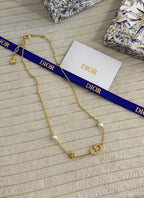 Dior Petit CD Jewelry Set (Gold-Finish Metal with White Resin Pearls and Crystals)